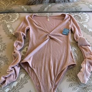 Free people salt pink body suit.